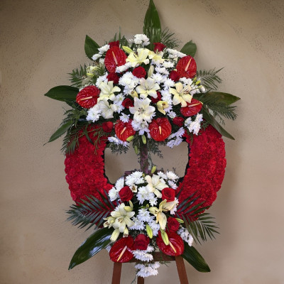 Corona Funeraria de flor natural elaborada con claveles y flores variadas